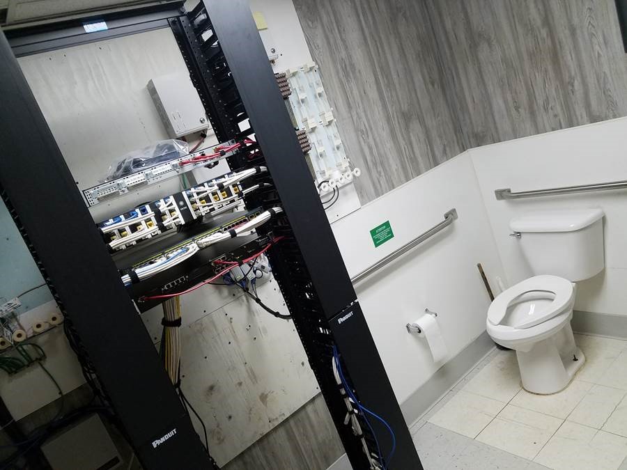 a server rack in a bathroom